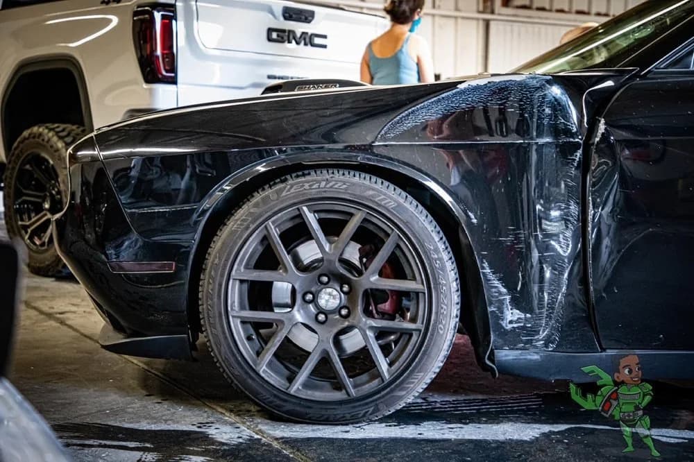 Paint protection film being applied to a vehicle at HADD Customs in Beverly Hills